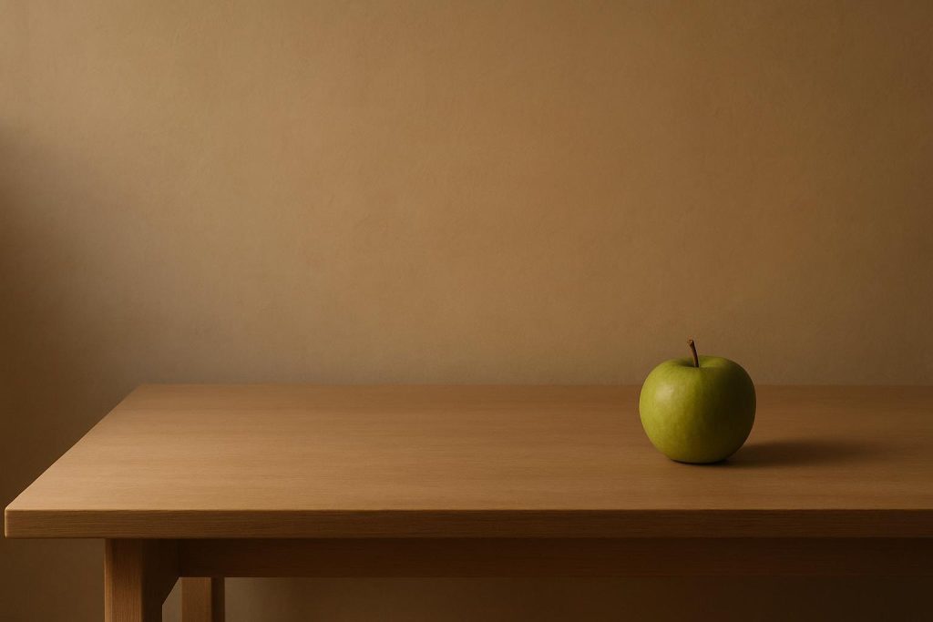 Minimal table setting with a single apple representing mindful eating and the concept of eating disorders.